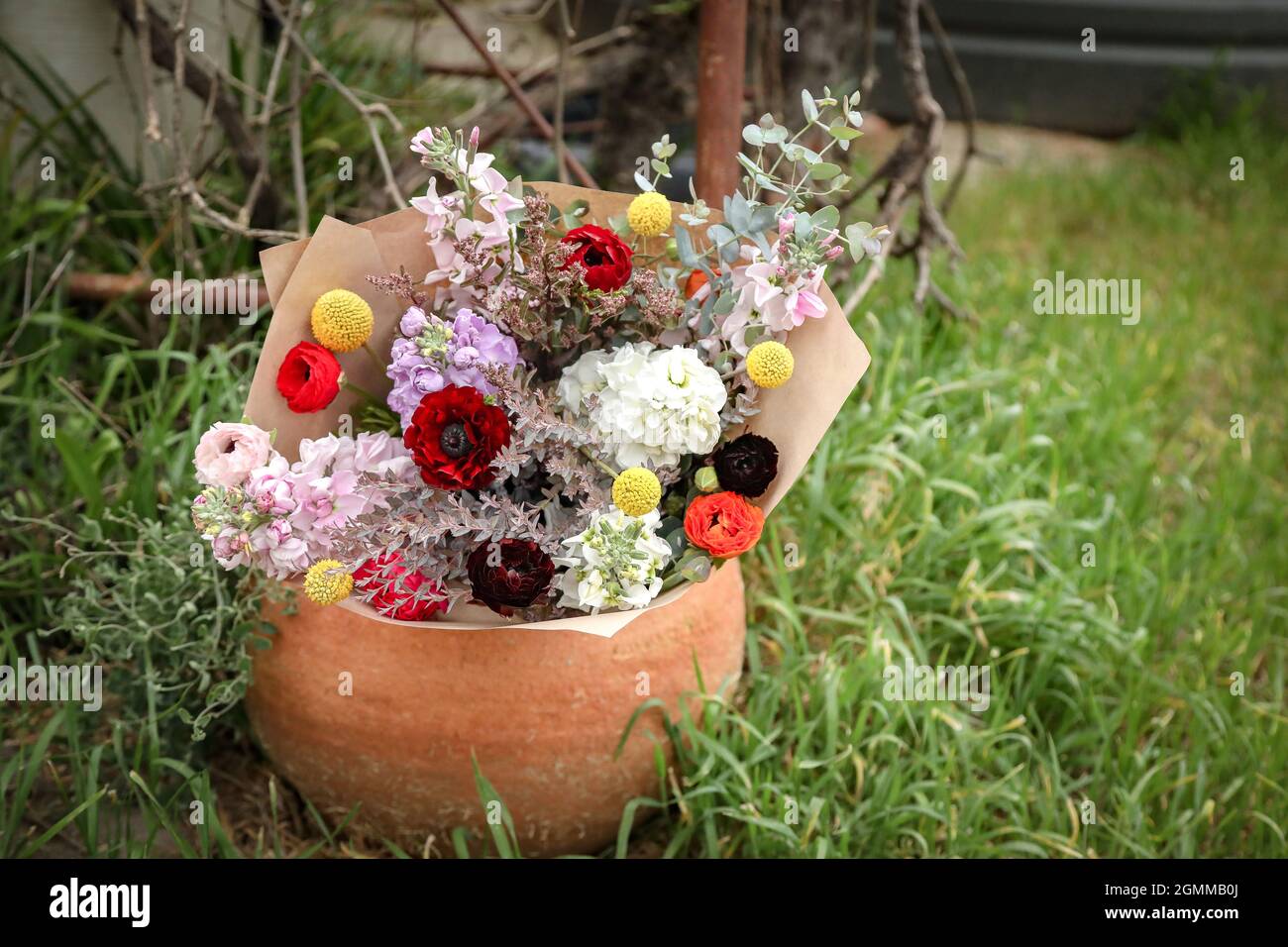 Bunch of beautiful cottage cut flowers in rustic country setting Stock Photo