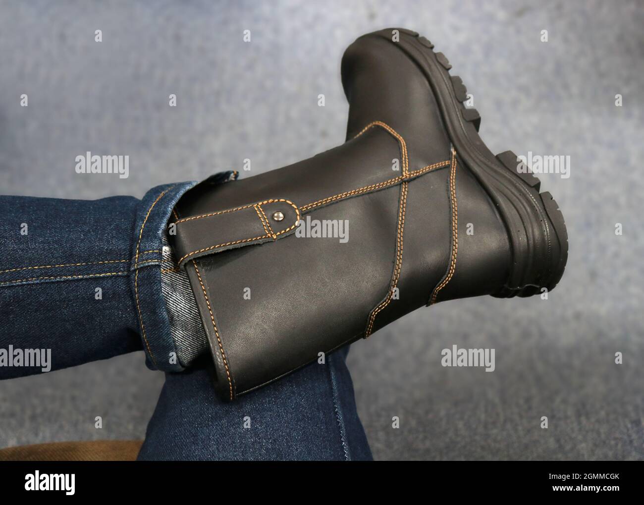 Jeans and boots are usually worn by cowboys or country singers and Native Americans Stock Photo