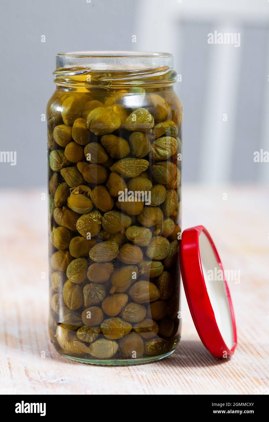 Pickled capers in glass jar Stock Photo Alamy