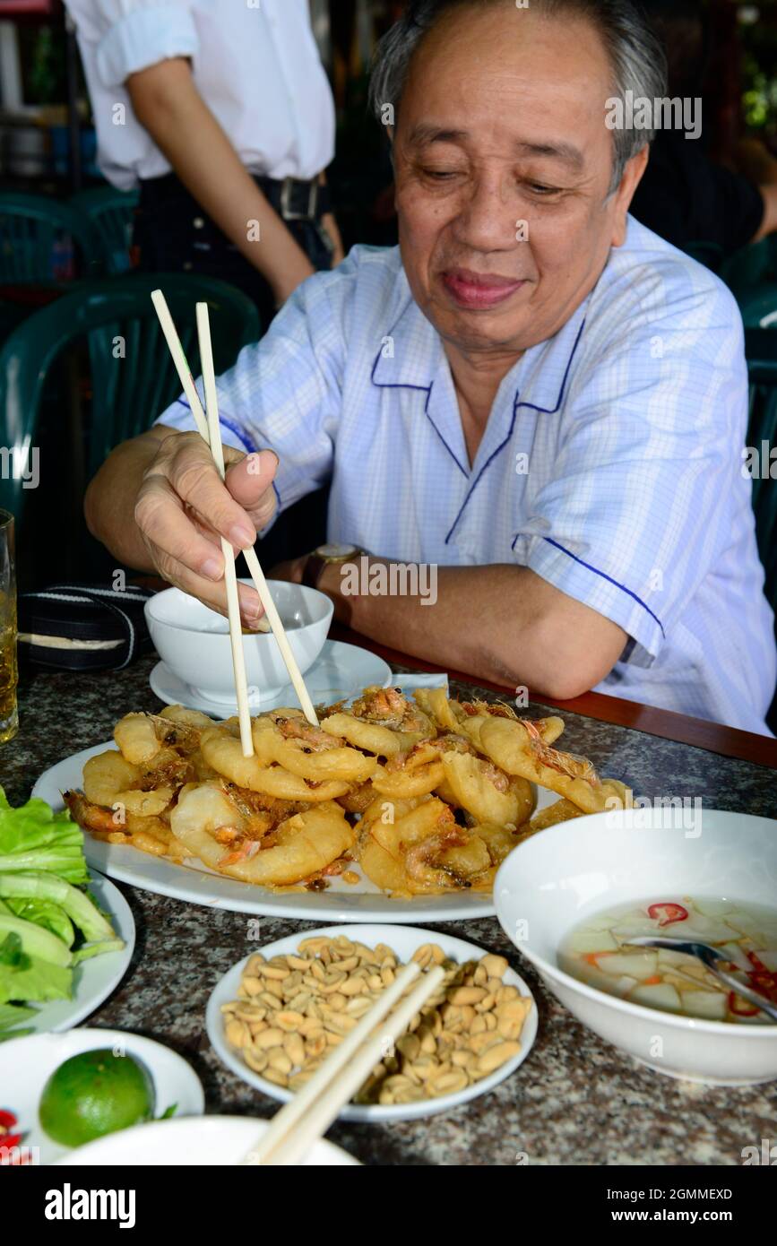 Banh Tom ( Vietnamese deep fried shrimp cake ) is a popular street food dish in Hanoi, Vietnam