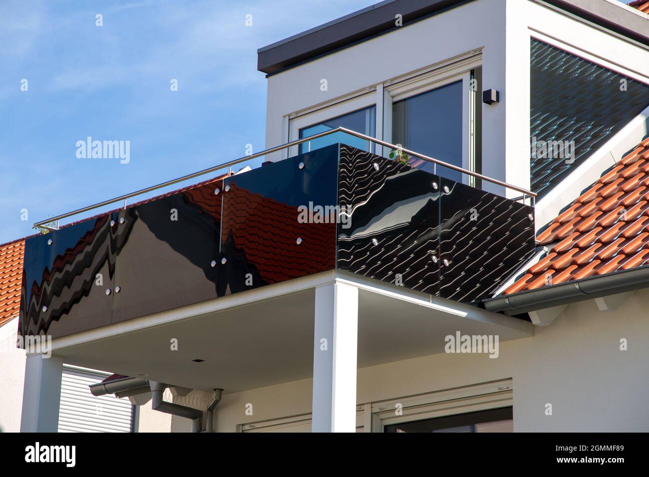 Black balcony railing made of glass and stainless steel Stock Photo Alamy