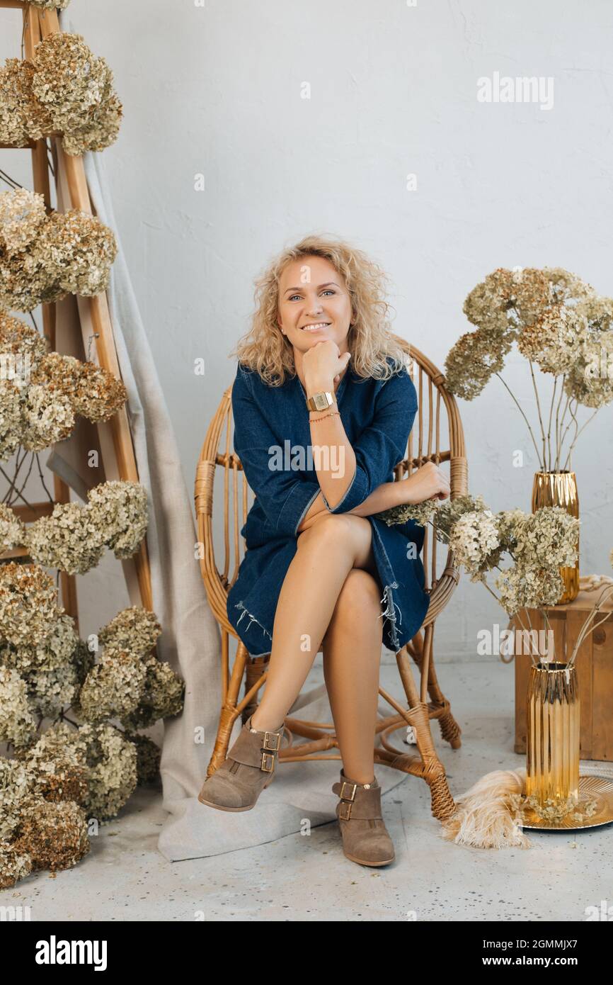 dried hydrangea flowers garden woman decor, looking into frame, happy,  smiling. Portrait of happy man among natural decoration of flowers. Florist  is Stock Photo - Alamy