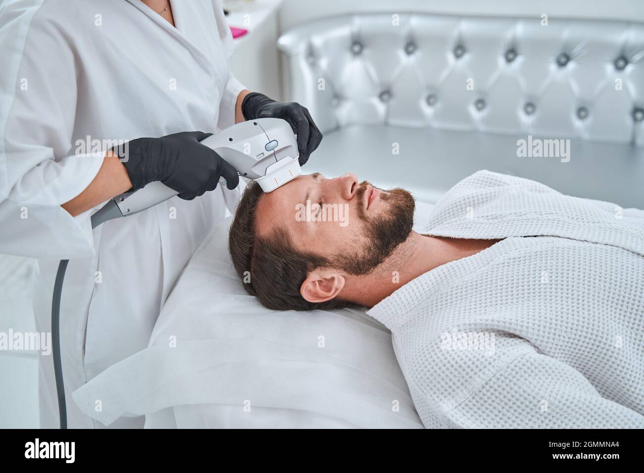 Man during ultrasound non invasive hi-res stock photography and images ...