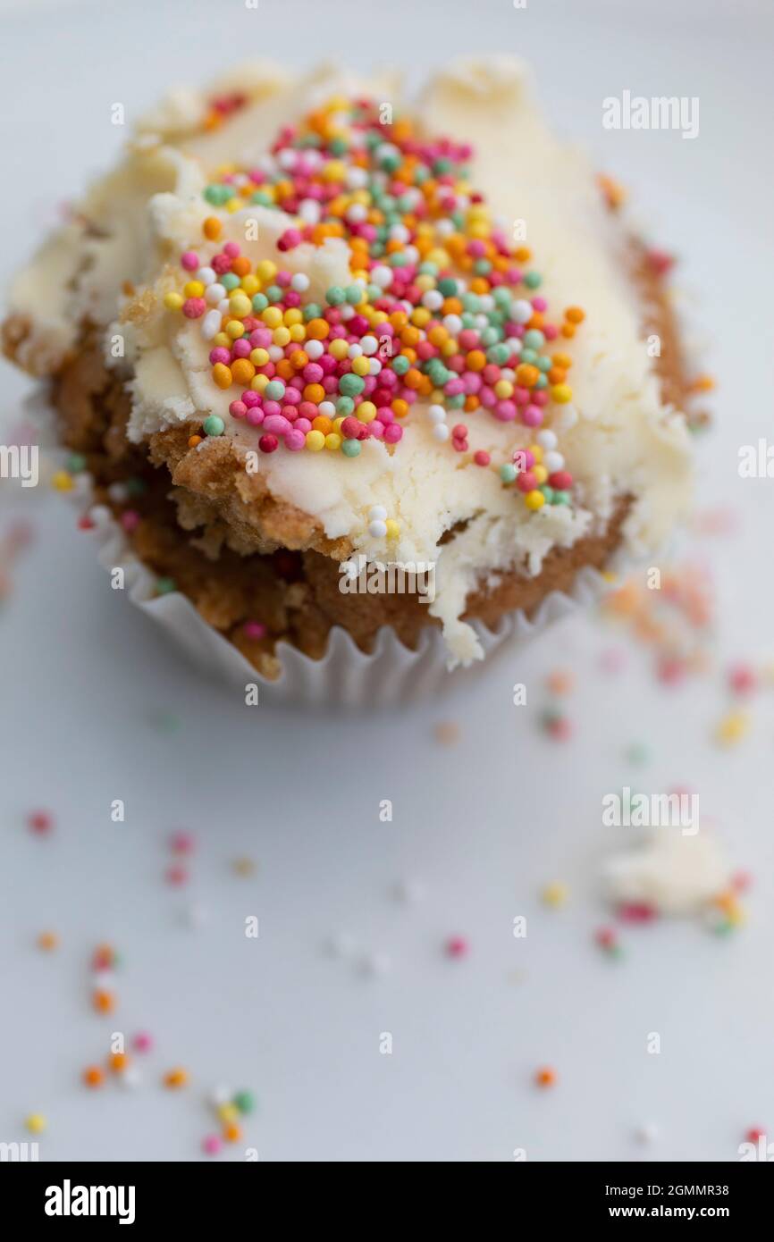 Close up sprinkles on frosted cupcake Stock Photo