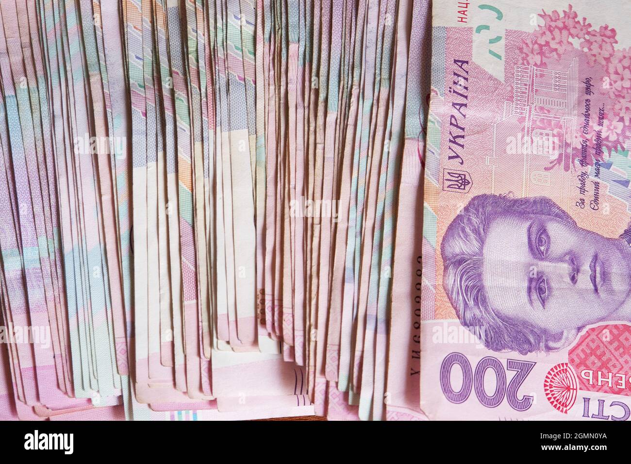 A bunch of banknotes with a face value of two hundred hryvnias. Ukrainian money. Stock Photo