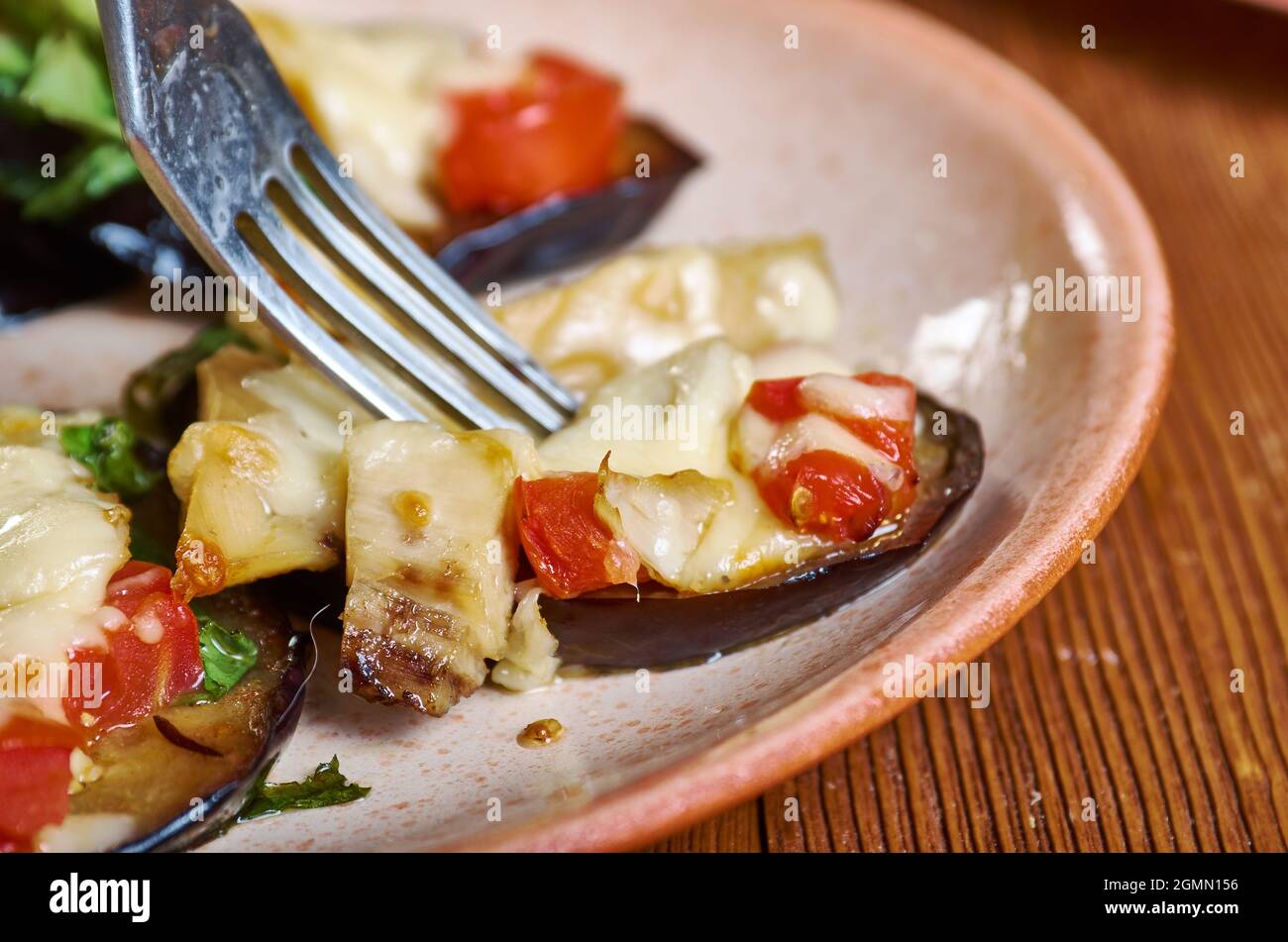 Melanzane al forno Baked eggplant with anchovies and cheese Stock Photo