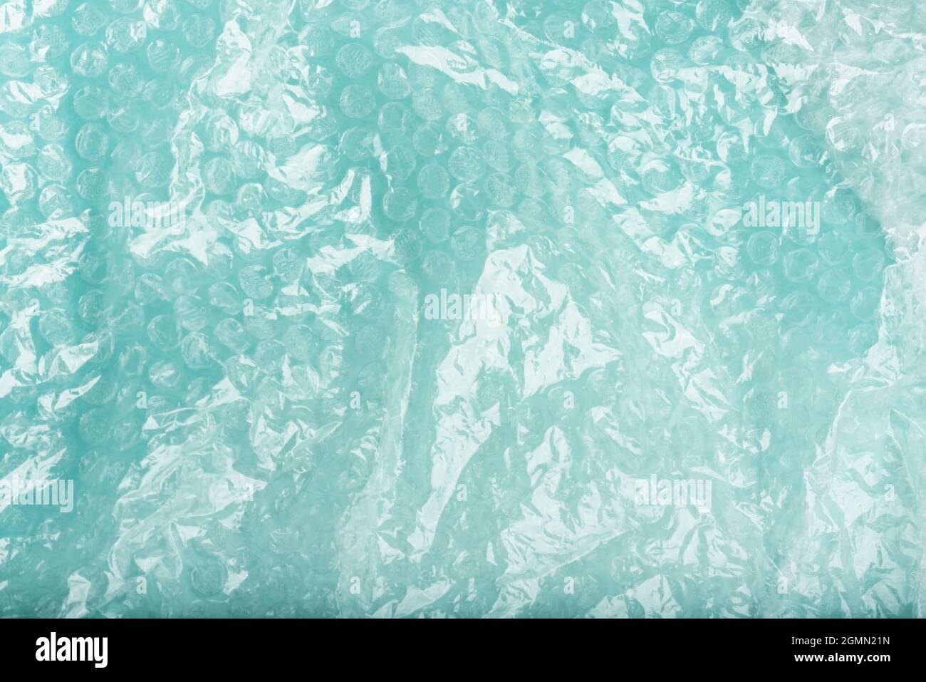 White bubble wrap packing texture on bluefor your creative backgrounds. Stock Photo