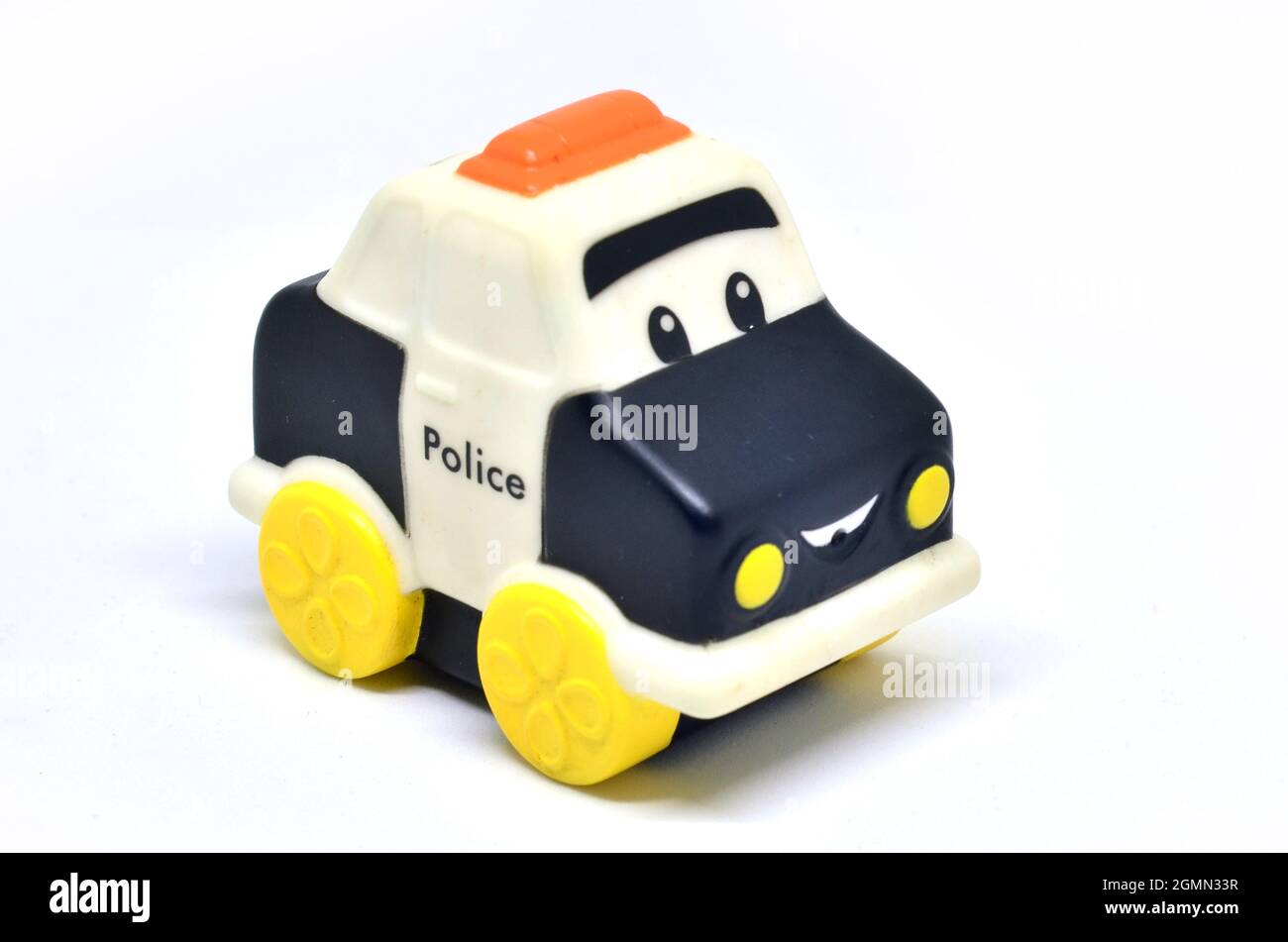 Rubber police toy car on a white background Stock Photo