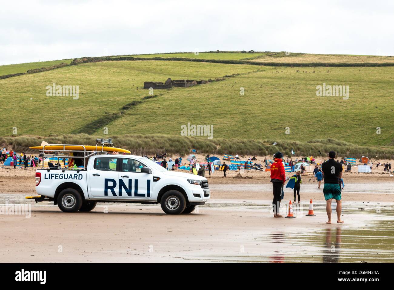 A RNLI patrol vehicle is parked on Bantham Beach, Devon. Stock Photo