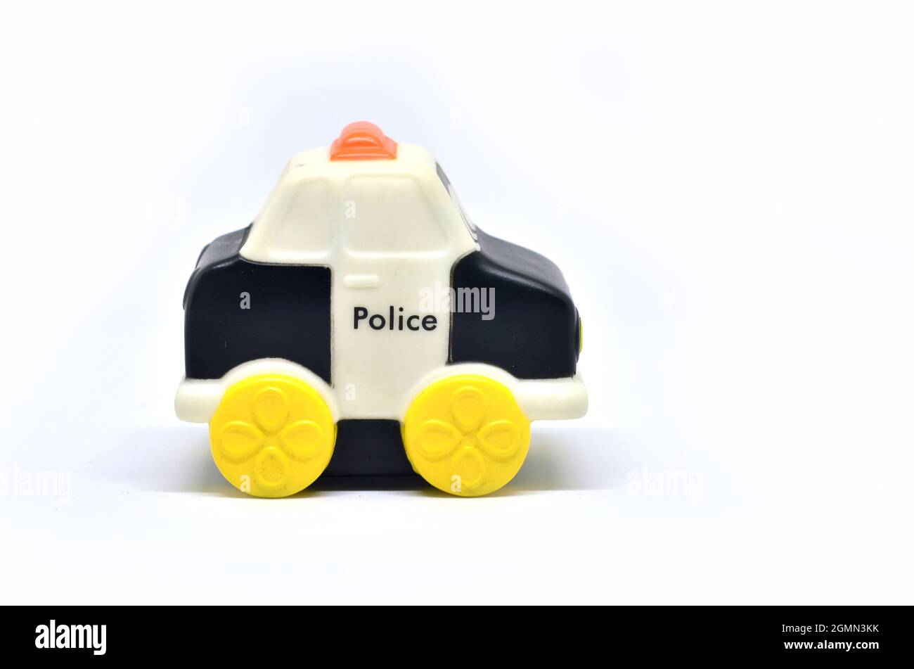 Rubber police toy car on a white background Stock Photo