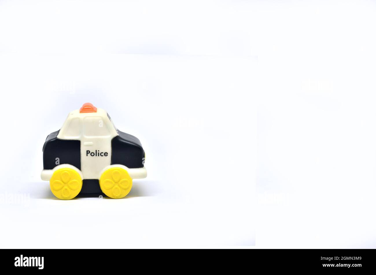 Rubber police toy car on a white background Stock Photo