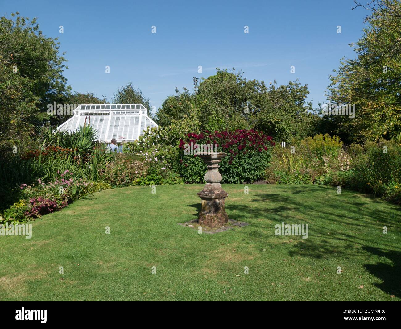 Garden of Broughton House18th-century town house High Street  Kirkcudbright. Dumfries and Galloway Scotland sundial in formal garden Stock Photo