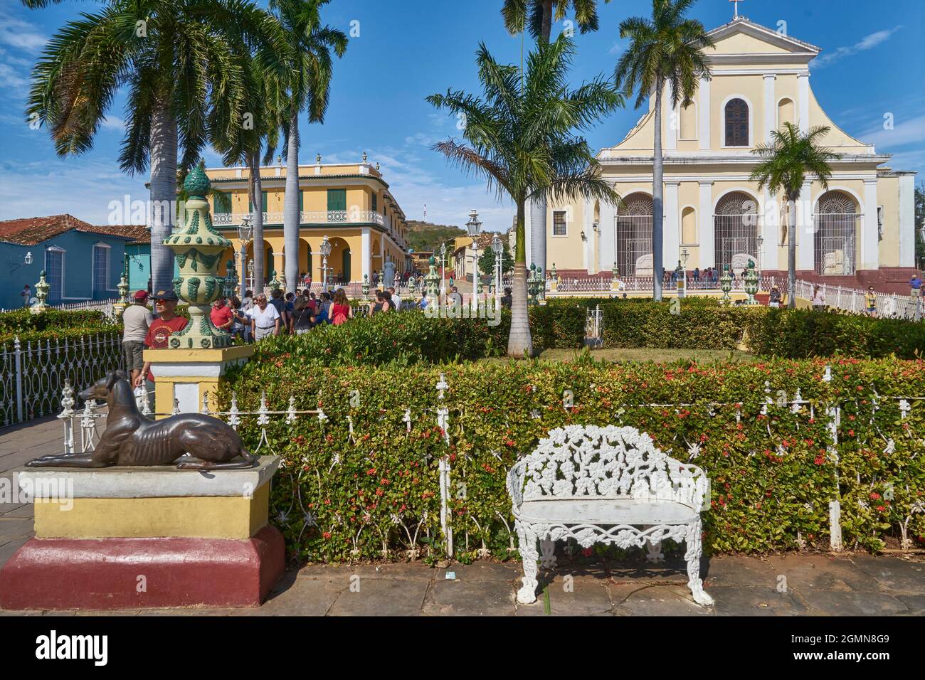 Plaza Mayor with church Iglesia de la Santissima (right) and palace Palacio Brunet (left), Cuba, Trinidad Stock Photo