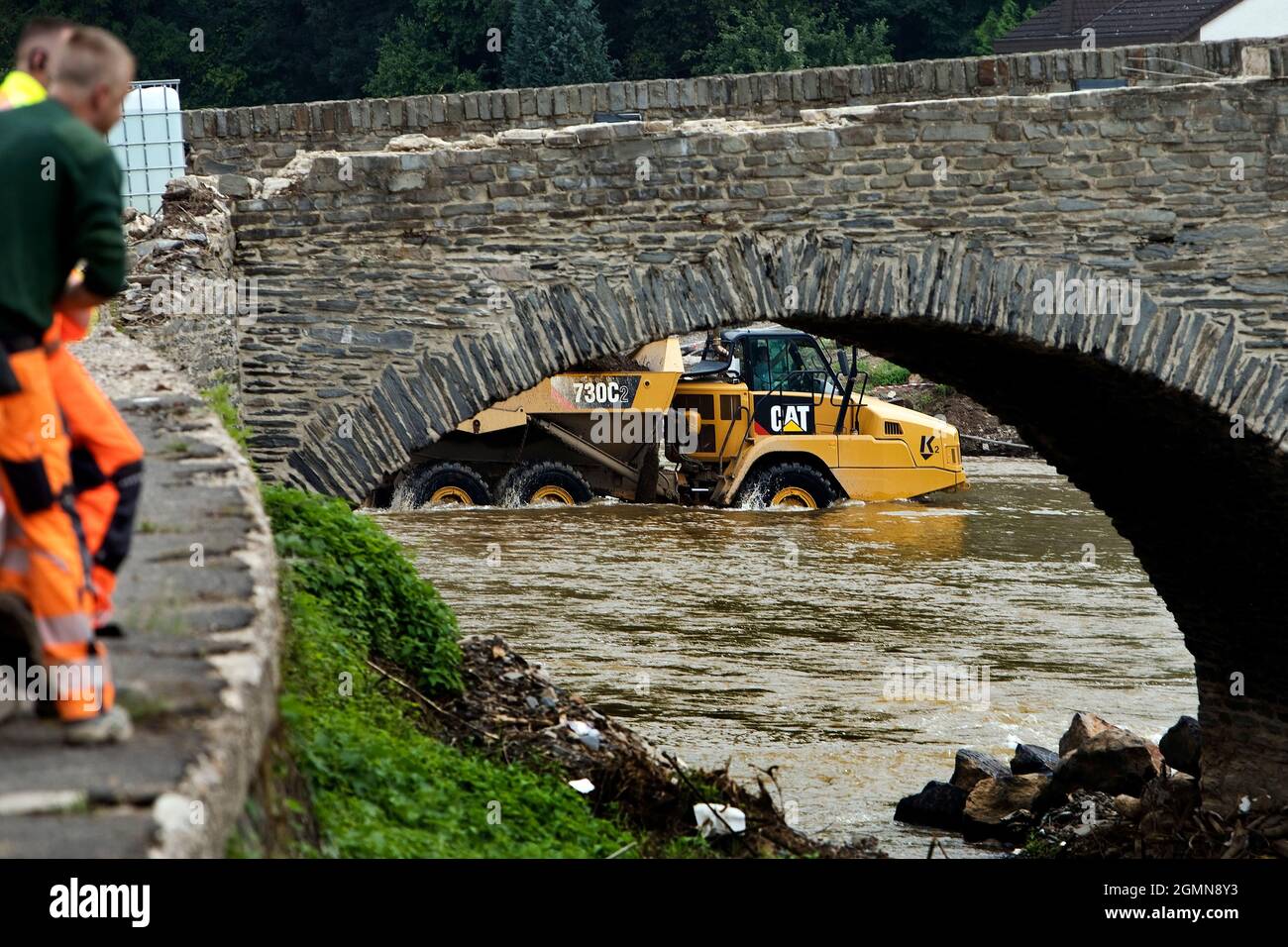 flood disaster 2021 Ahrtal, Ahr valley, rear dump truck for construction of Bailey bridge beside the destroyed Nepomuk bridge, Germany, Stock Photo