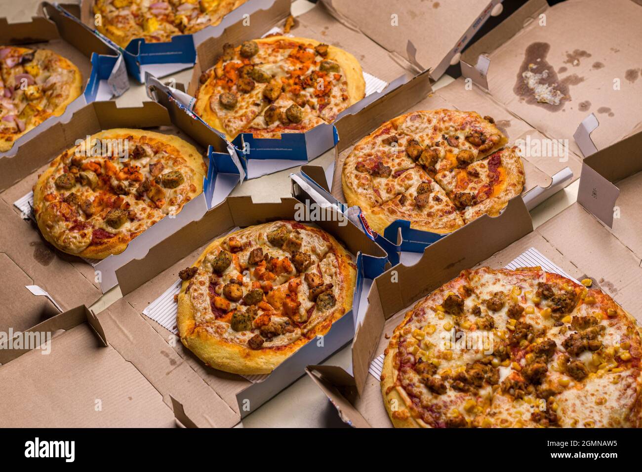 West Bangal, India - August 21, 2021 : Dominos pizza on box stock image. Stock Photo