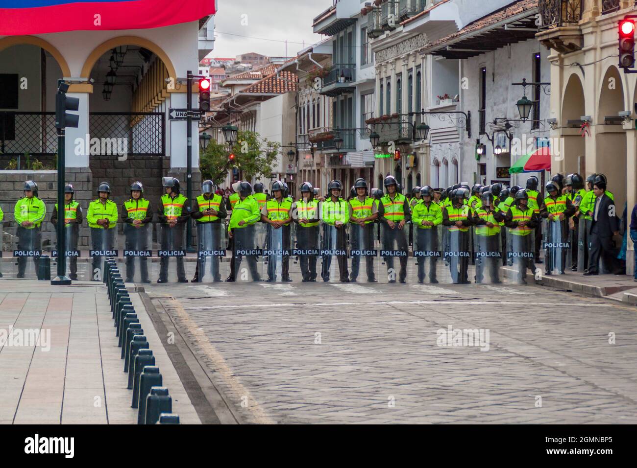 CUENCA, ECUADOR - JUNE 17, 2015: Lined police in the center of Cuenca, Ecuador Stock Photo