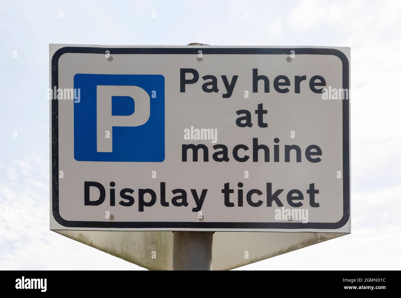 Parking Machine Sign A car parking sign telling you to pay at the machine and display the ...
