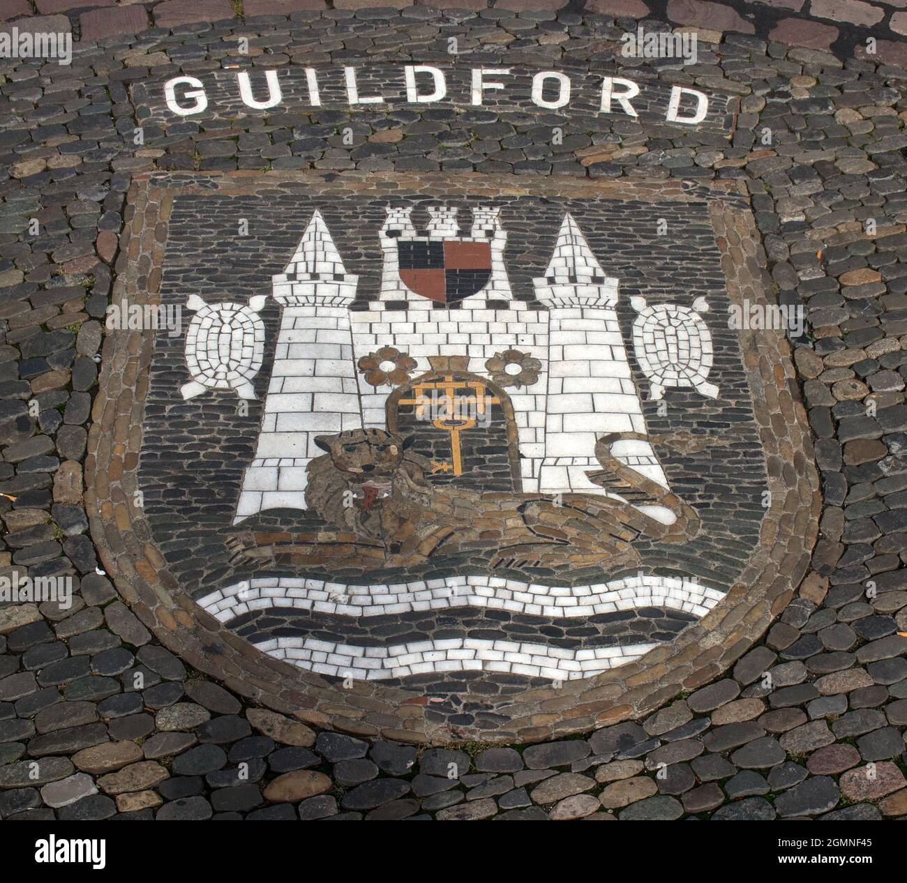A pavement mosaic in Freiburg, Germany, of the Coat of Arms of the Borough of Guildford, Surrey, with which it is twinned Stock Photo
