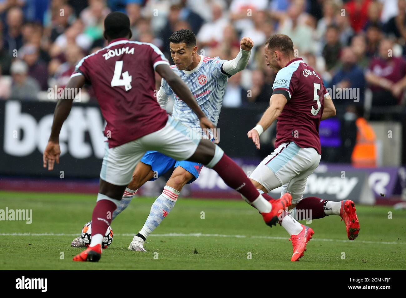 London, UK. 19th Sep, 2021. Cristiano Ronaldo of Manchester United (c) has a shot at goal. Premier League match, West Ham Utd v Manchester Utd at the London Stadium, Queen Elizabeth Olympic Park in London on Sunday 19th September 2021. this image may only be used for Editorial purposes. Editorial use only, license required for commercial use. No use in betting, games or a single club/league/player publications. pic by Andrew Orchard/Andrew Orchard sports photography/Alamy Live news Credit: Andrew Orchard sports photography/Alamy Live News Stock Photo