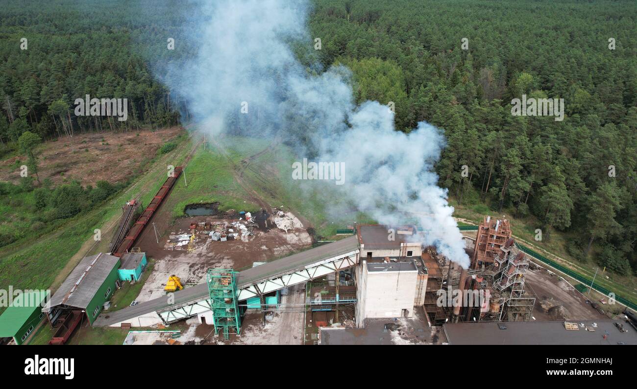 Environment pollution theme. Smoke from plant aerial drone view Stock Photo