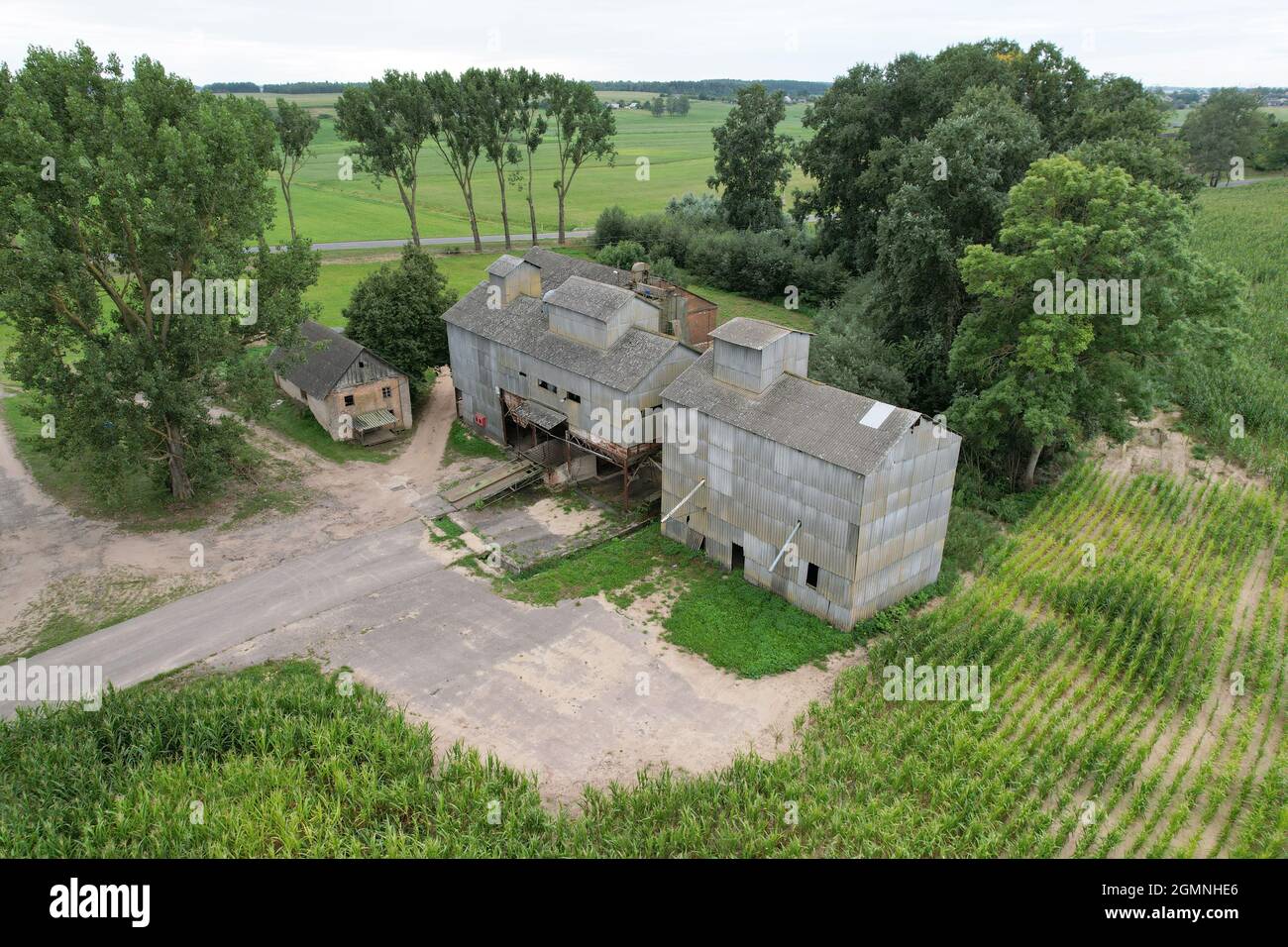 Old beer factory aerial drone view around agriculture field Stock Photo