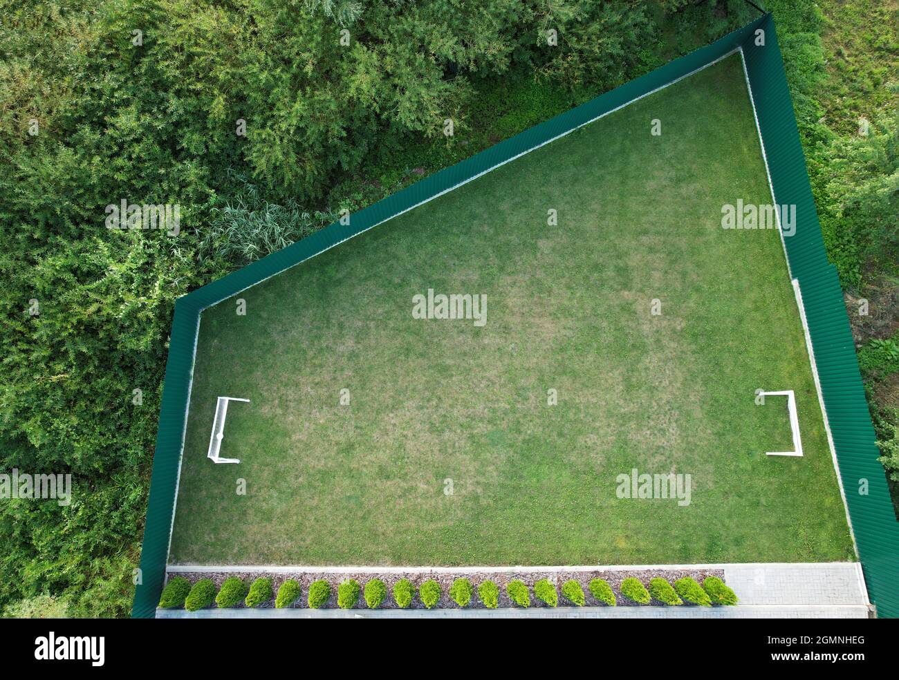 Backyard with football field aerial drone top view Stock Photo