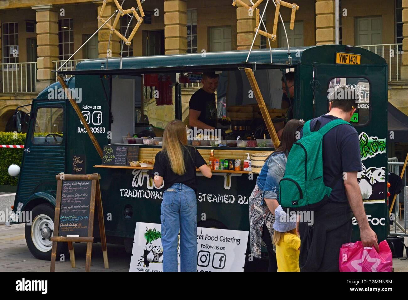 HALIFAX. WEST YORKSHIRE. ENGLAND. 05-29-21. The historic Piece Hall in the the town centre. Takeaway food at a bank holiday craft and makers market. Stock Photo