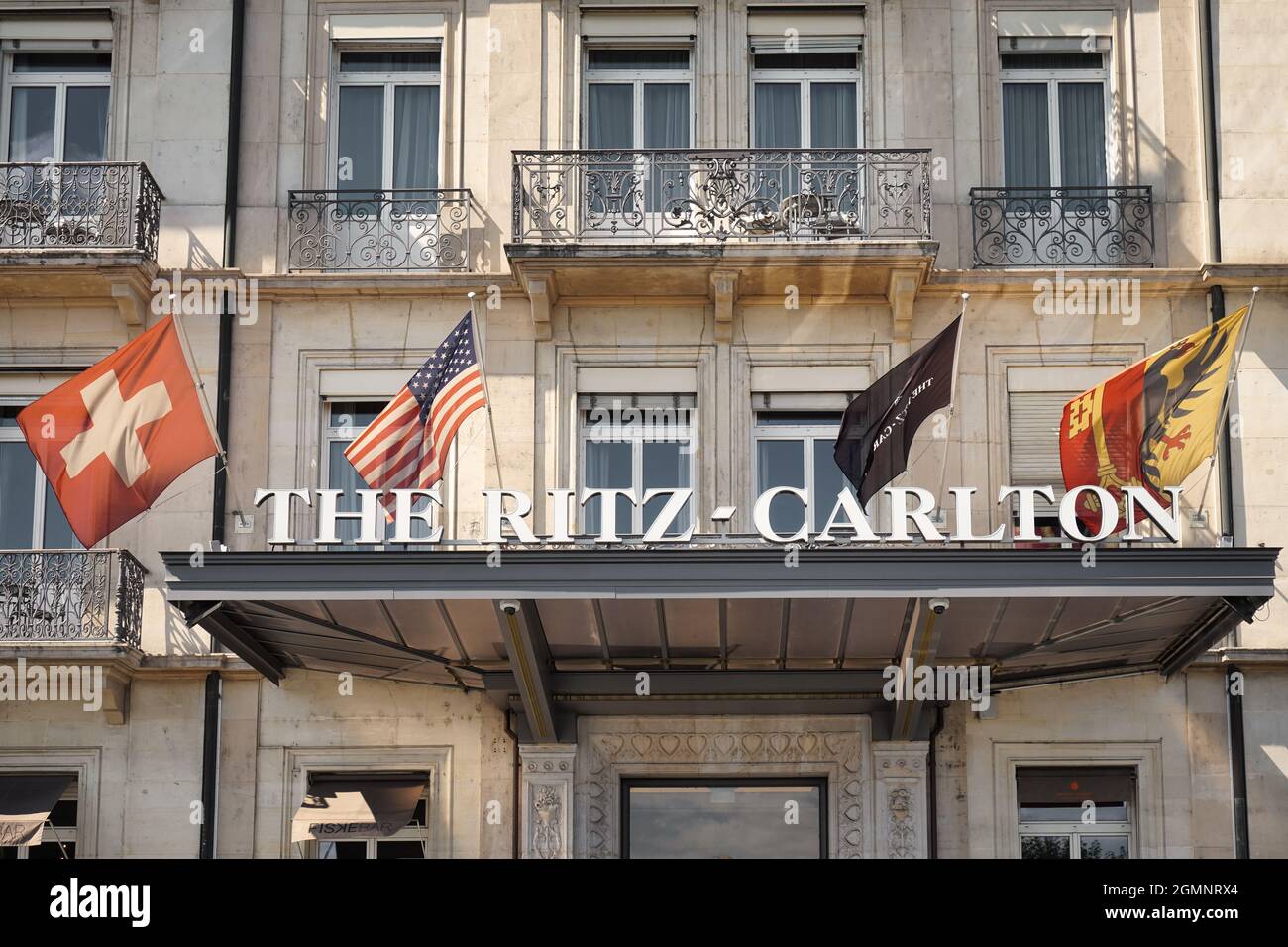 GENEVA, SWITZERLAND - AUGUST 31, 2021: The Ritz-Carlton Hotel de la Paix, Geneva. Famous five-star luxury hotel on the shore of Lake Geneva. Stock Photo