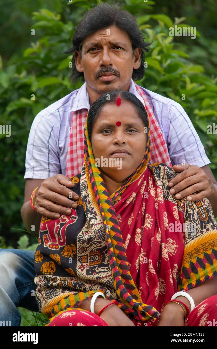 Indian Rural couple sitting in agricultural field Stock Photo - Alamy