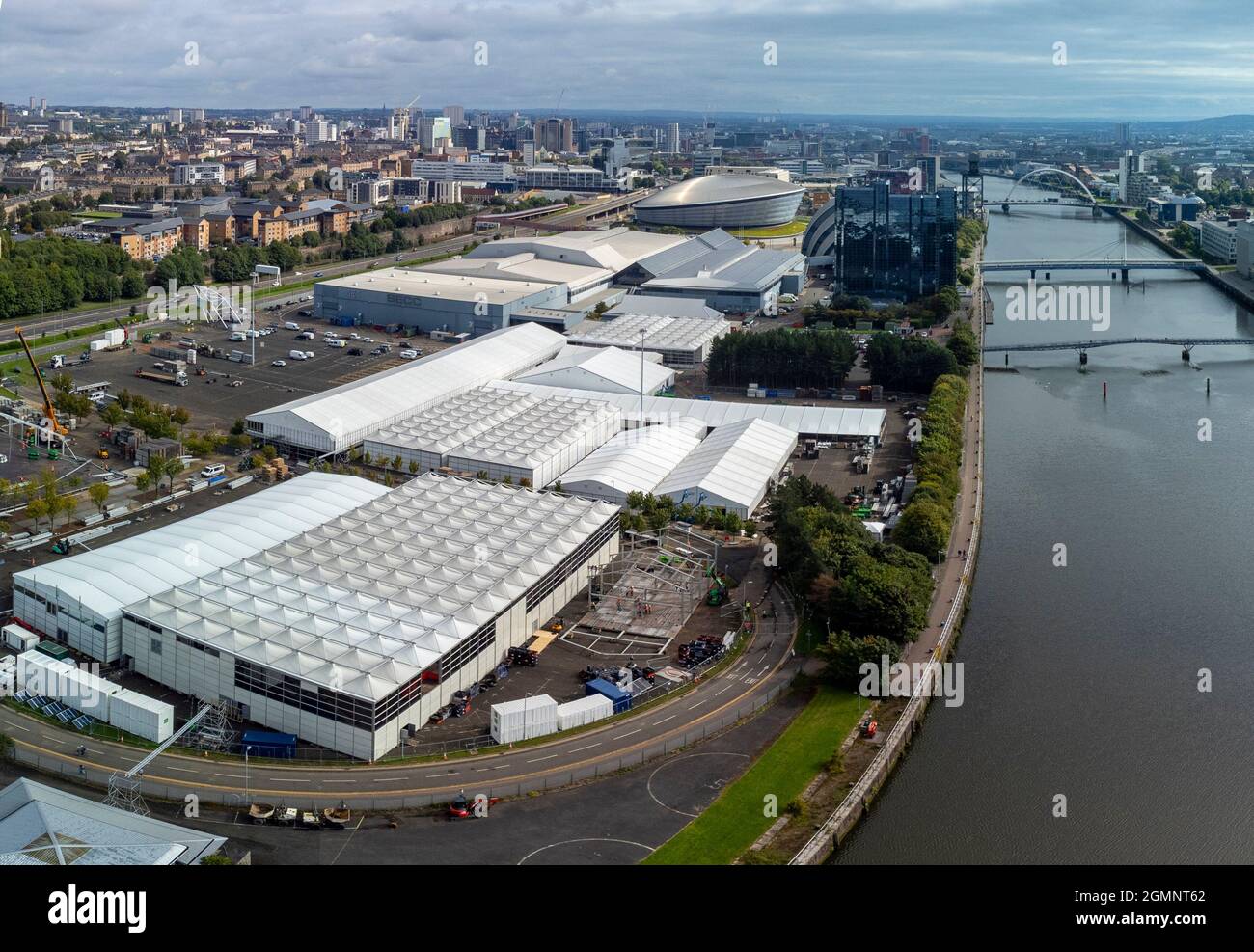 Glasgow, Scotland, UK. 20th September 2021. Aerial views of the site of the COP26 international climate change conference and summit to be held in Glasgow during November 2021. The site is beside the River Clyde at the Scottish Event Campus and large temporary structures can be seen being erected to house the tens of thousands of delegates, heads of state and journalists who will attend the two week event.  Iain Masterton/Alamy Live News. Stock Photo