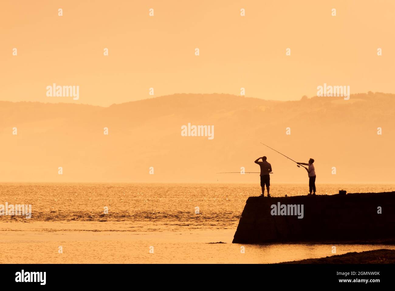 Father son sunset silhouette hi-res stock photography and images - Alamy