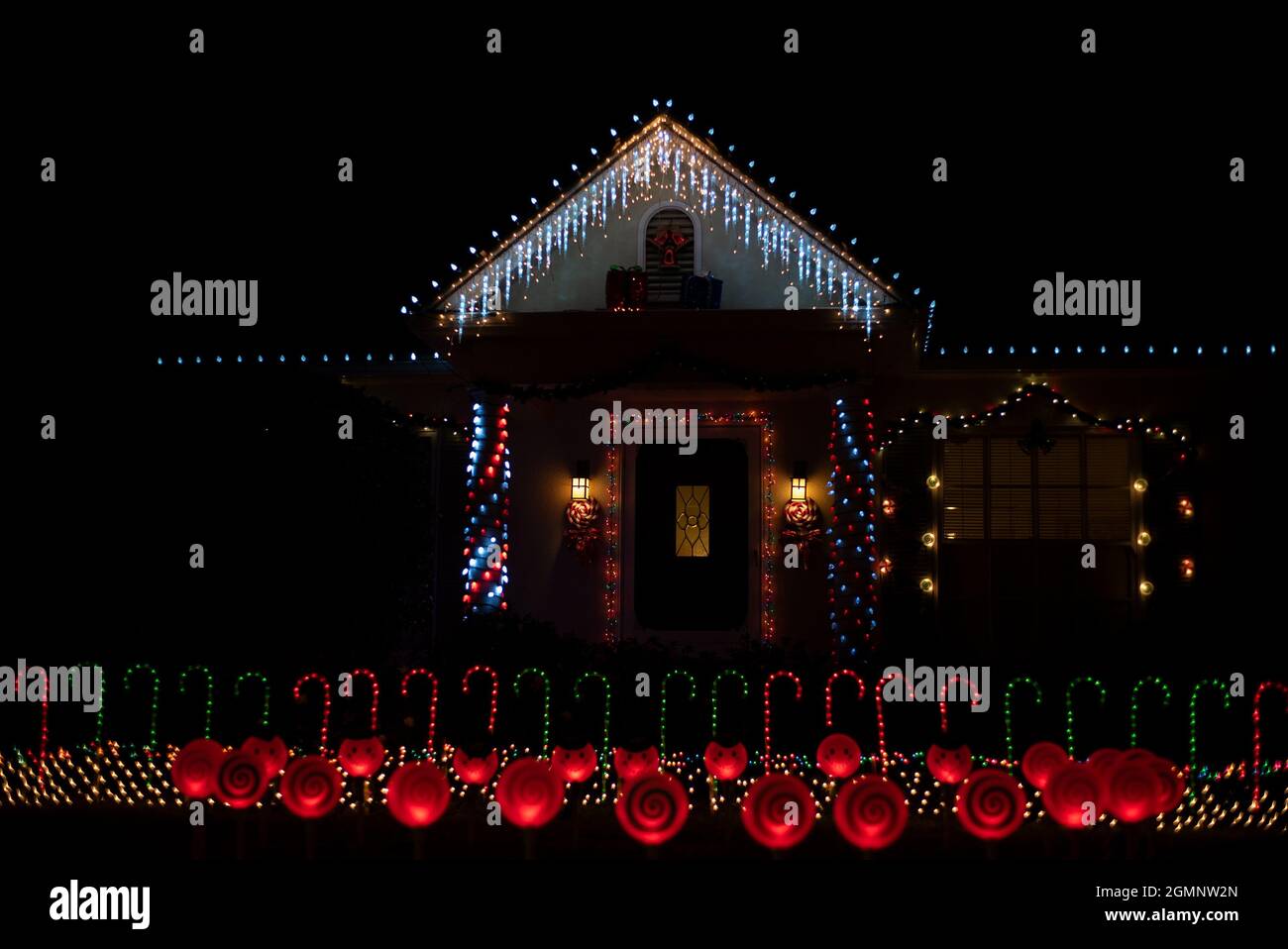 Beautiful Americana yard and house decoration with LED lights for the HOliday season Stock Photo