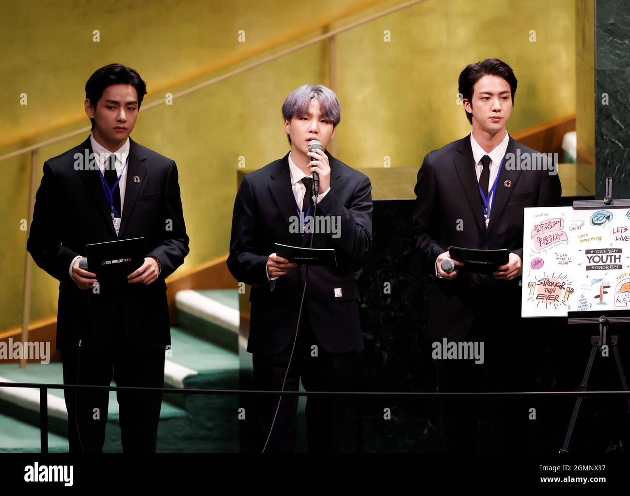 L To R V Suga And Jin Of South Korean Boy Band Bts Speak At The Sdg Moment Event As Part Of The Un General Assembly 76th Session General Debate In Un