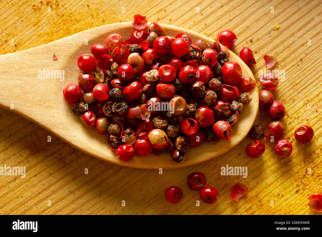 Red hot pepper and black pepper seeds Stock Photo Alamy