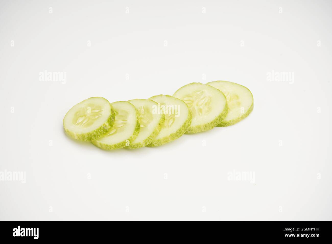 Cucumber Slice On White Background Stock Photo