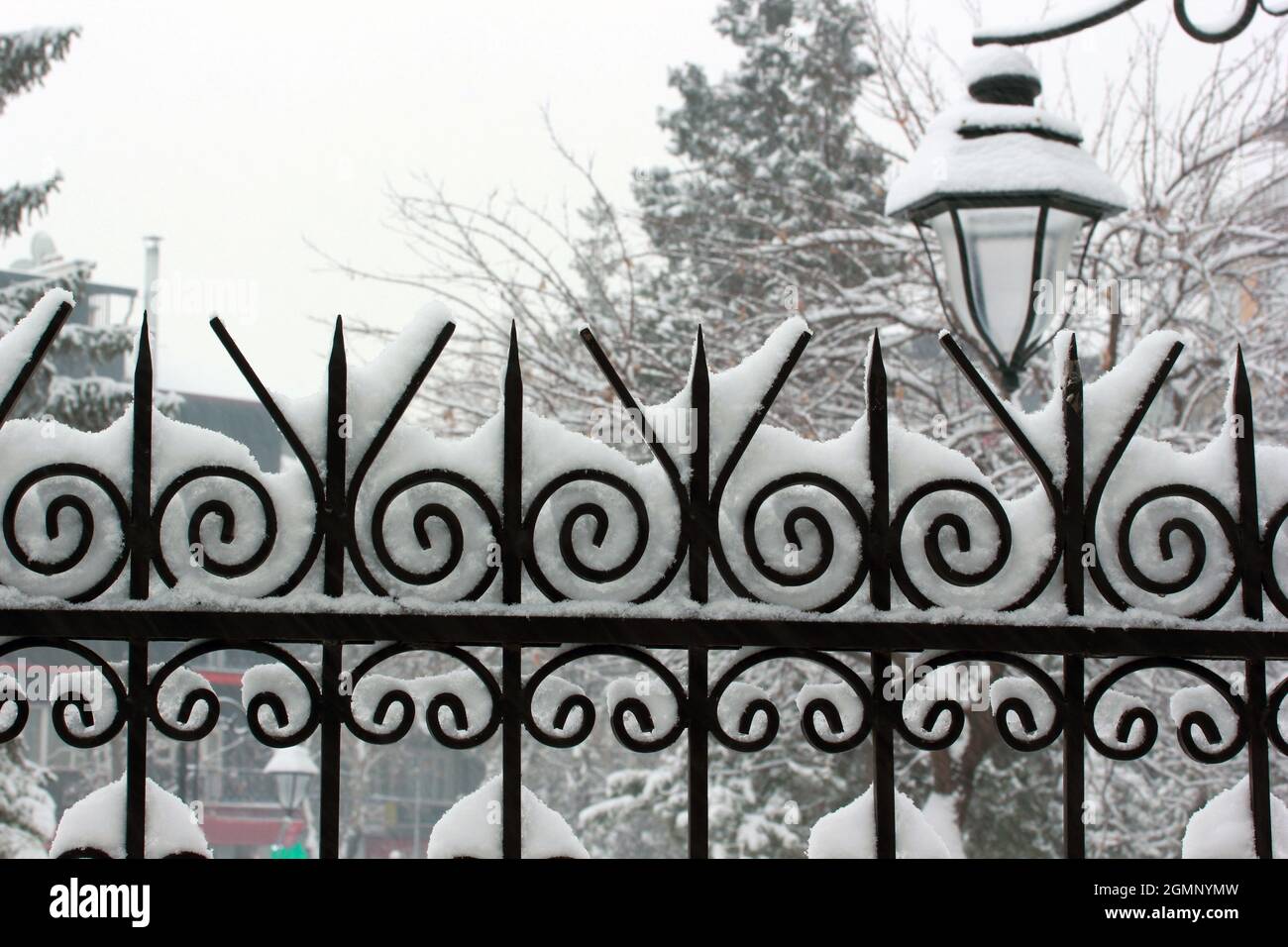 Snow on garden wrought iron Stock Photo - Alamy