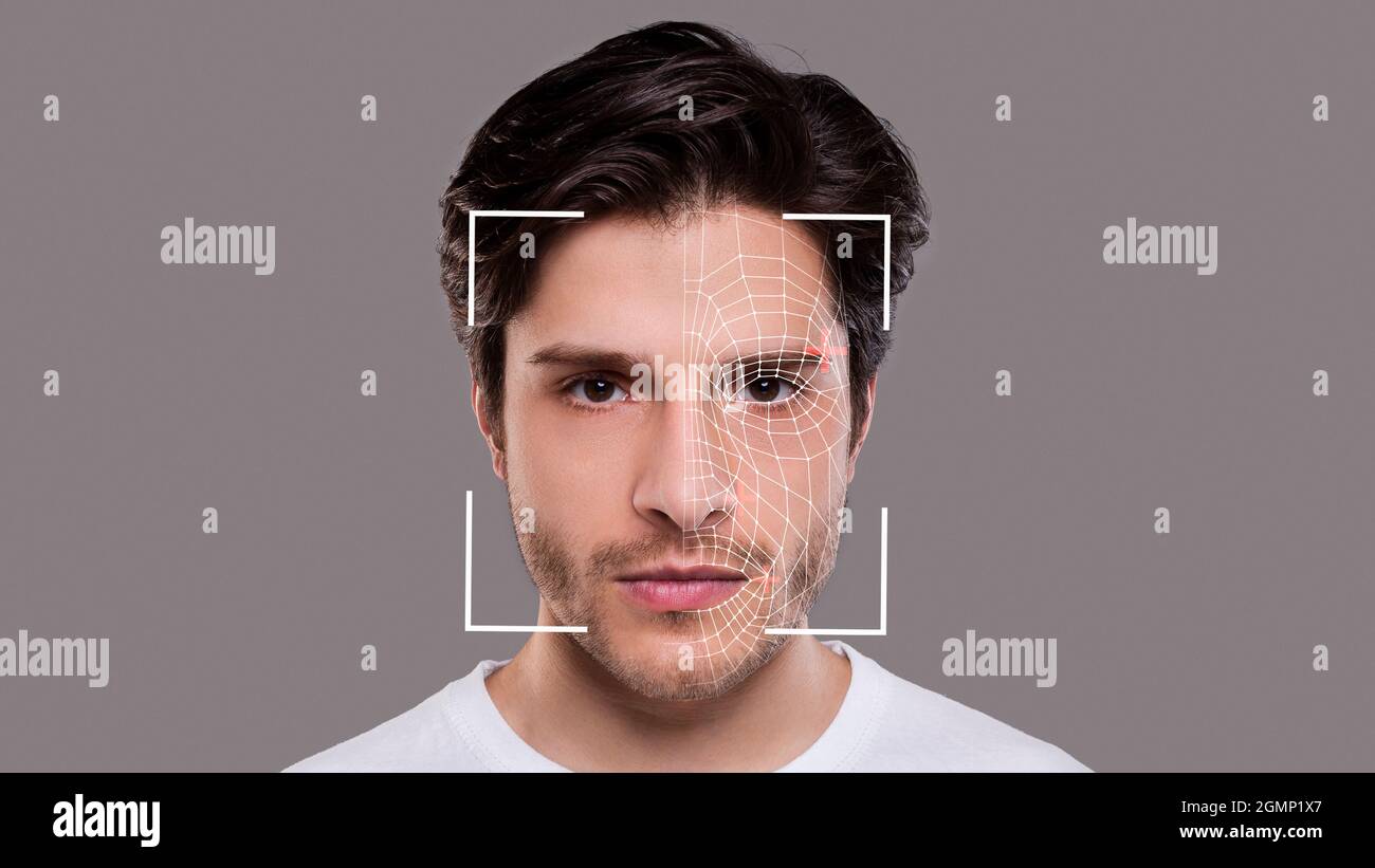 Young man experiencing face scanning, face id Stock Photo Alamy