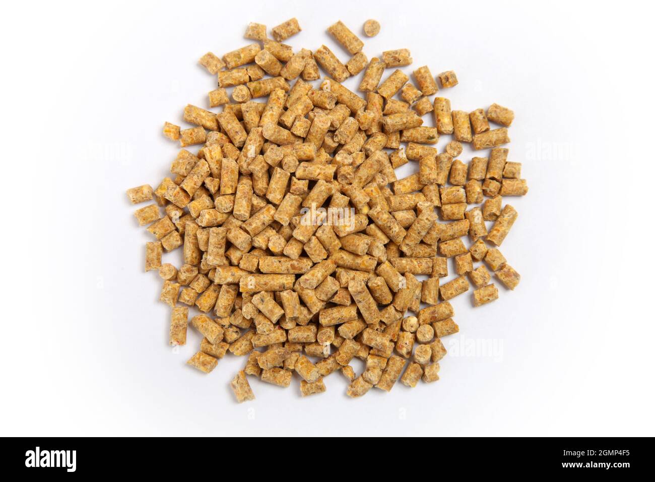 Pile of compound feed pellets isolated on white.   Animal feed. Stock Photo