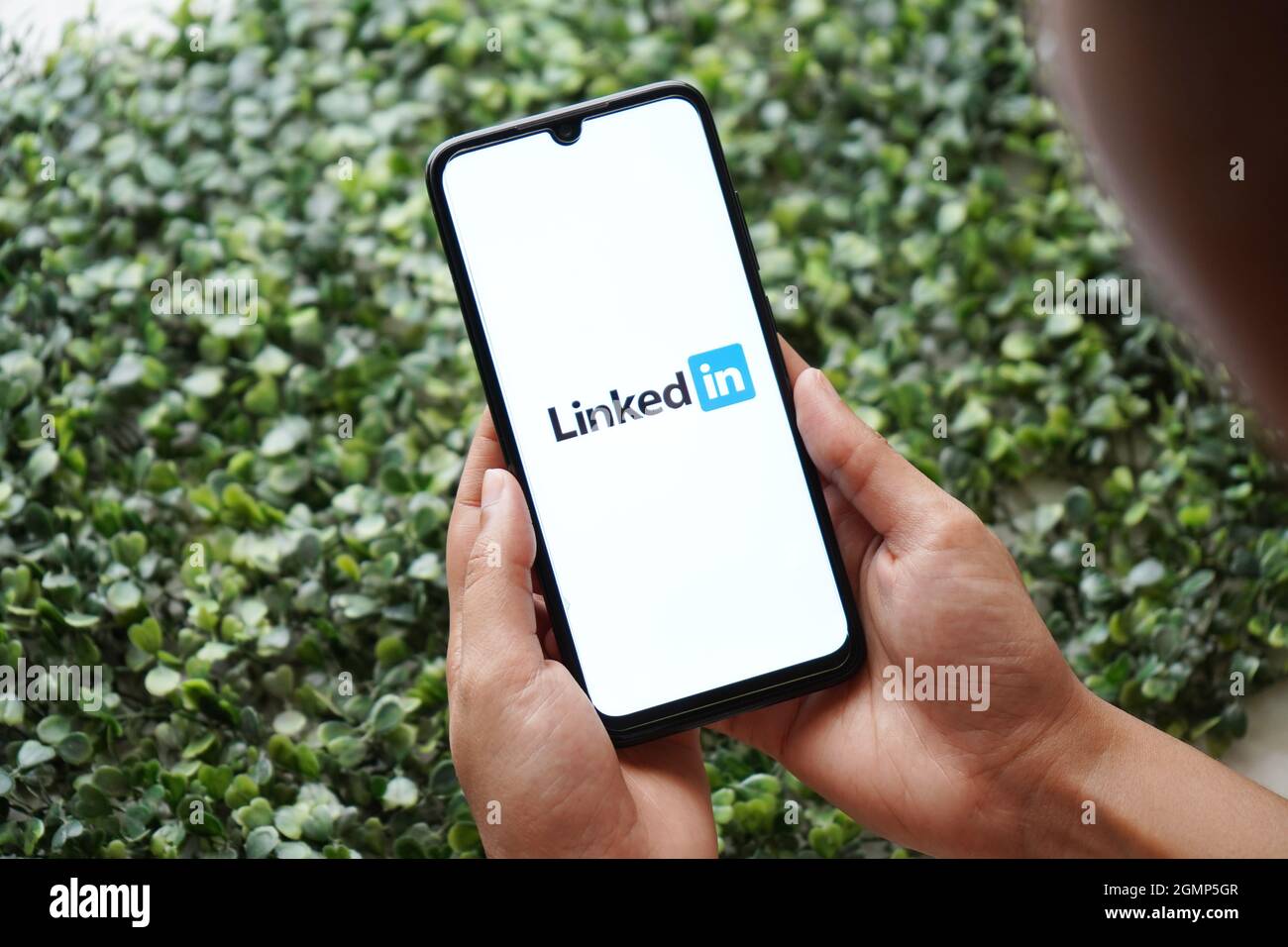 New Delhi, India - 13.09.2020: Using LinkedIn Application in Smartphone Stock Photo