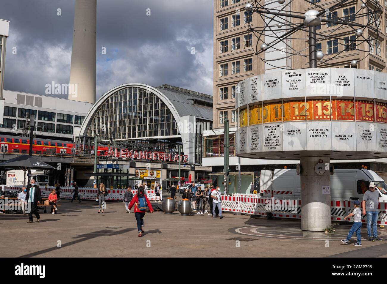 Berlin, Germany - August 2, 2021: Alexanderplatz city square in central Mitte district with view to World Time Clock and train station Stock Photo