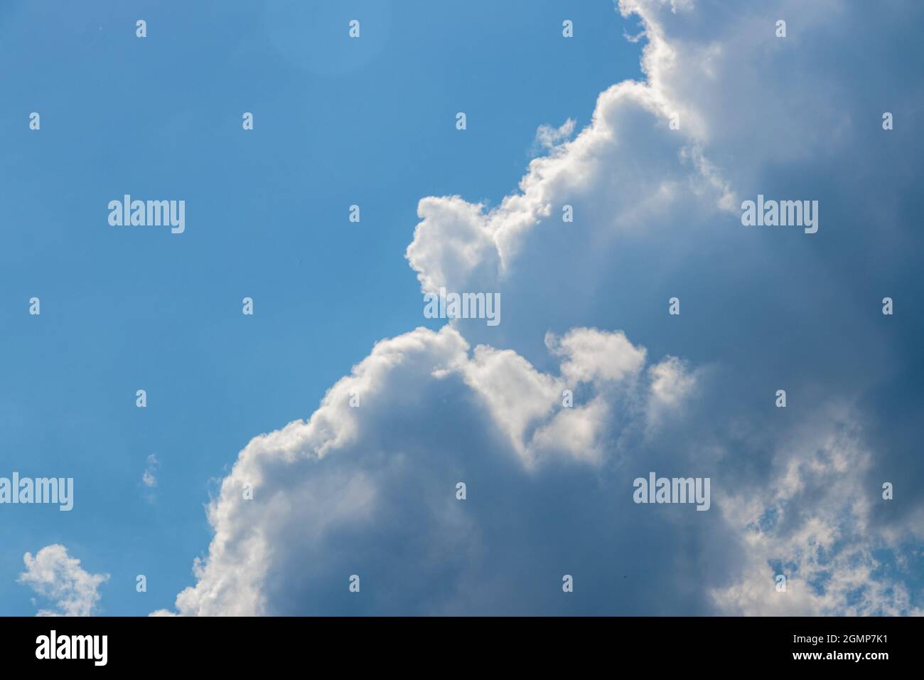 blue sky with white fluffy clouds in bright day Stock Photo - Alamy