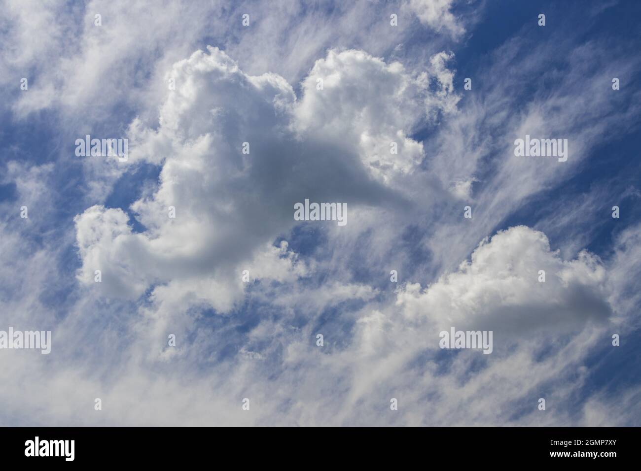 blue sky with white fluffy clouds in bright day Stock Photo - Alamy