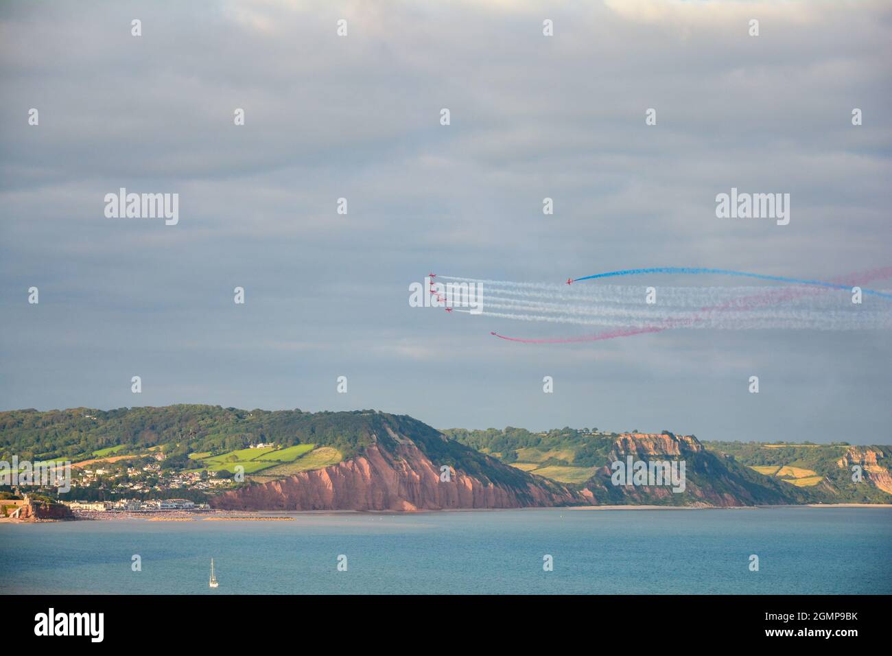 Sidmouth, September 2021: The Royal Air Force (RAF) Red Arrows perform with their BAE Hawk jet aircrafts at Sidmouth Air Show Stock Photo