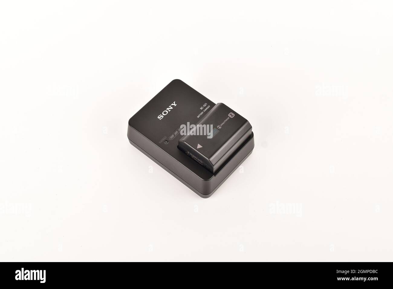 Camera battery charging Isolated on White Background Stock Photo Alamy