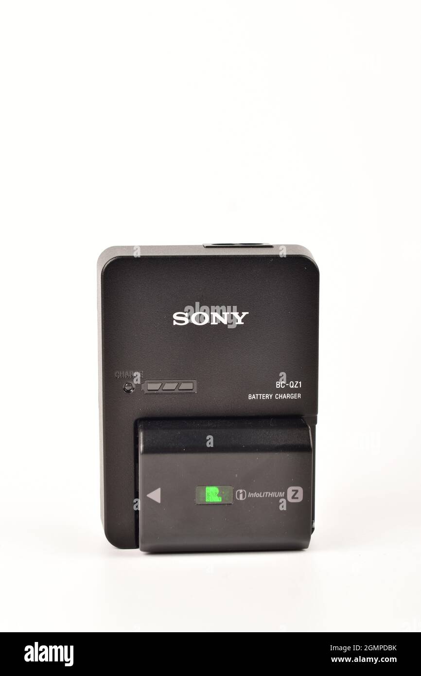 Camera Battery with Charger Isolated on White Background with Clipping