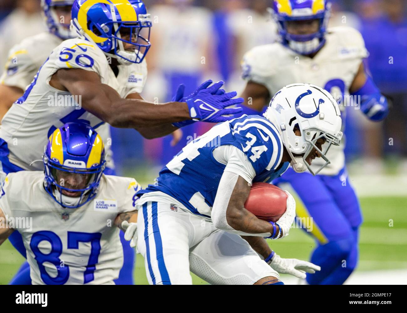 Indianapolis, Indiana, USA. 19th Sep, 2021. Indianapolis Colts defensive back Isaiah Rodgers (34) returns kickoff during NFL football game action between the Los Angeles Rams and the Indianapolis Colts at Lucas Oil Stadium in Indianapolis, Indiana. Los Angeles defeated Indianapolis 27-24. John Mersits/CSM/Alamy Live News Stock Photo