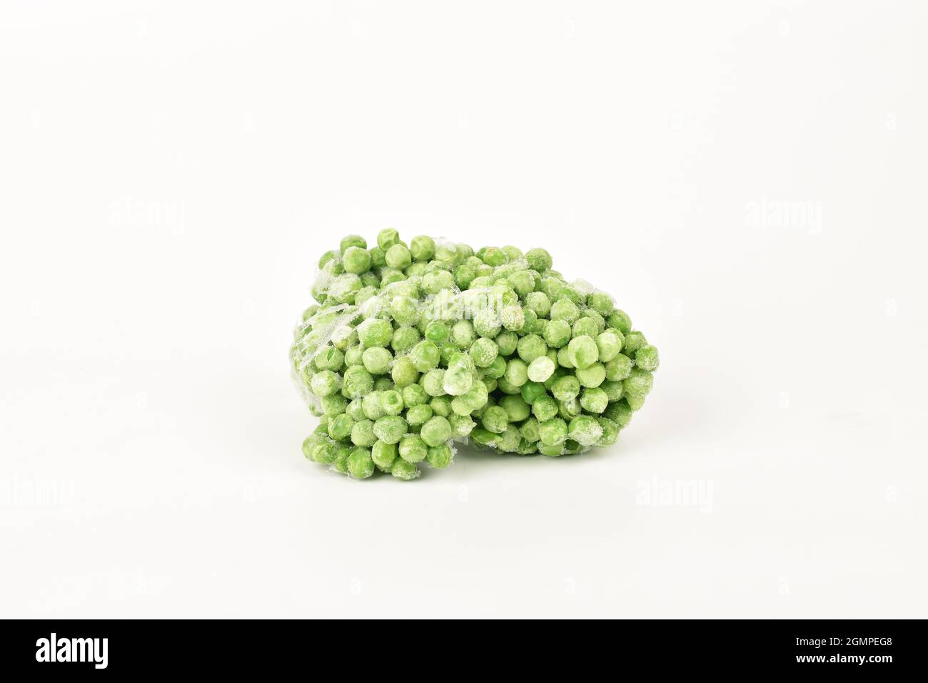 Top view of frozen peas isolated on white background Stock Photo