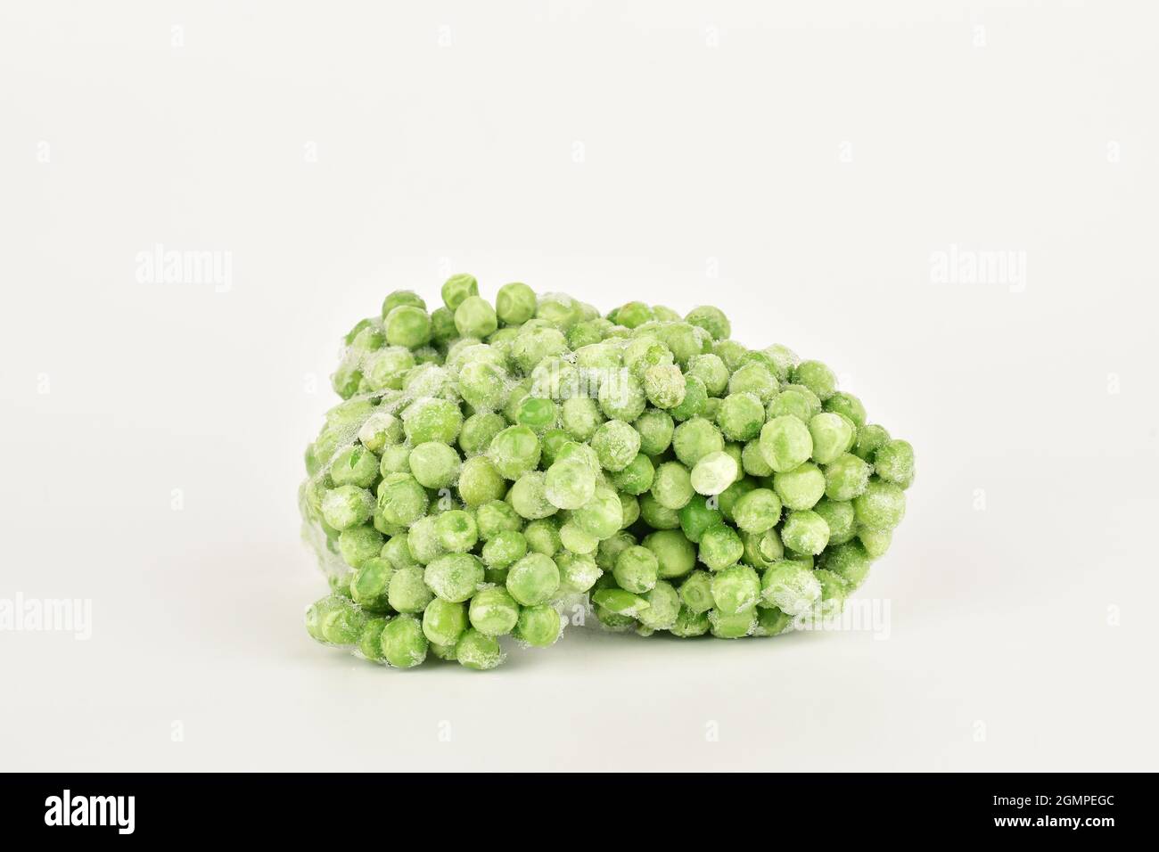 frozen peas isolated on white background Stock Photo