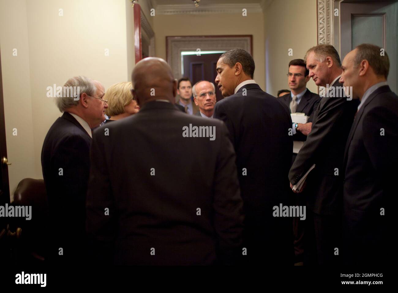 Prior to making a statement about reforming government defense contracts , President Obama is surrounded by participants, including Senator Carl Levin (D-MI), Rep. Peter Welch (D-VT), Sen. Claire McCaskill (D-MO),  Senator John McCain (R-AZ),  Rep. Edolphus Towns (D-NY), and OMB Director Peter Orszag, National Security Advisor Gen. James Jones and Phil Schiliro, Special Assistant to the President for Legislative Affairs. 3/4/09Official White House Photo by Pete Souza Stock Photo