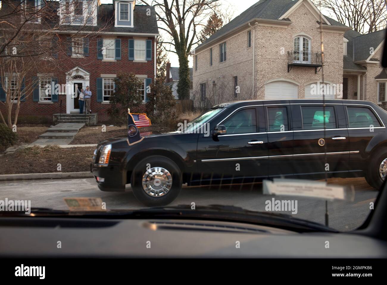 President Barack Obama and First Lady Michelle Obama ride in the presidential limousine on the way to attending a parent teacher meeting 3/6/09. Official White House Photo by Pete Souza Stock Photo